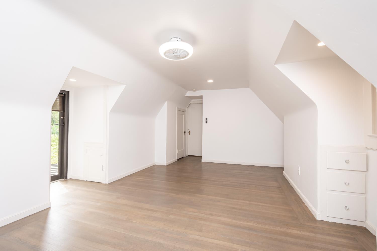 436 Hopkins Road Sacramento, CA 95864 - Photo 21 of 25 a view of an empty room with wooden floor