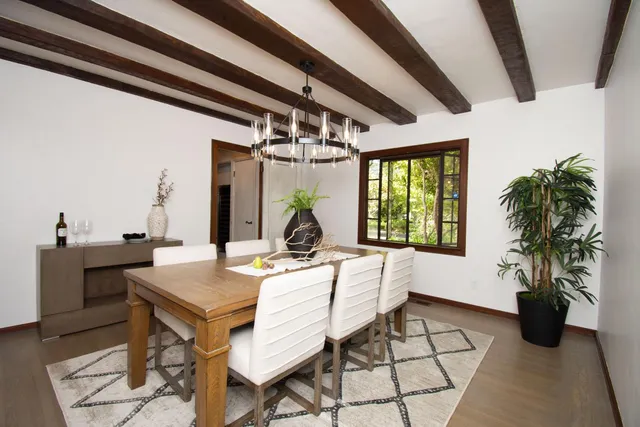 a view of a livingroom with furniture and window