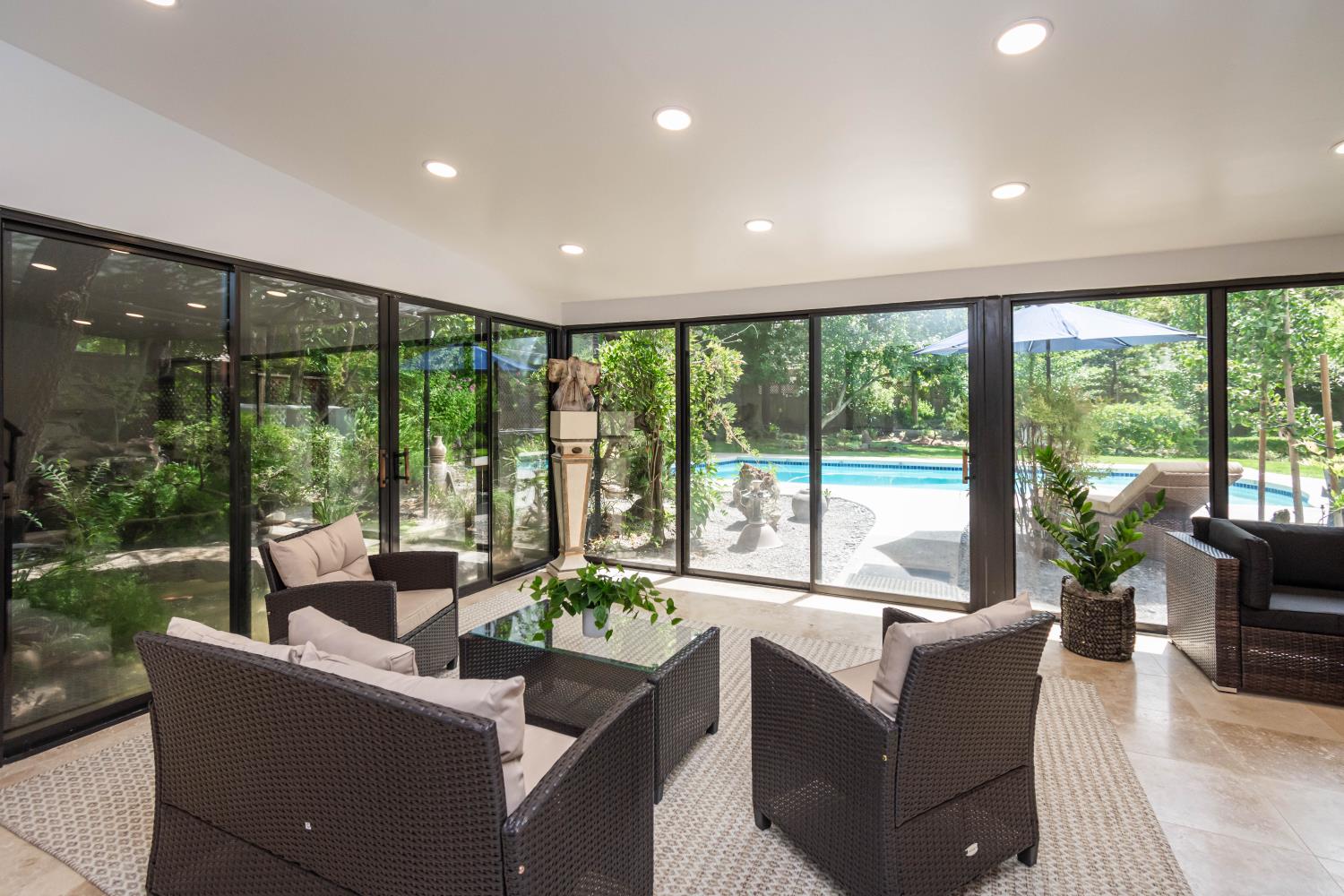 436 Hopkins Road Sacramento, CA 95864 - Photo 7 of 25 a living room with couch and a floor to ceiling window