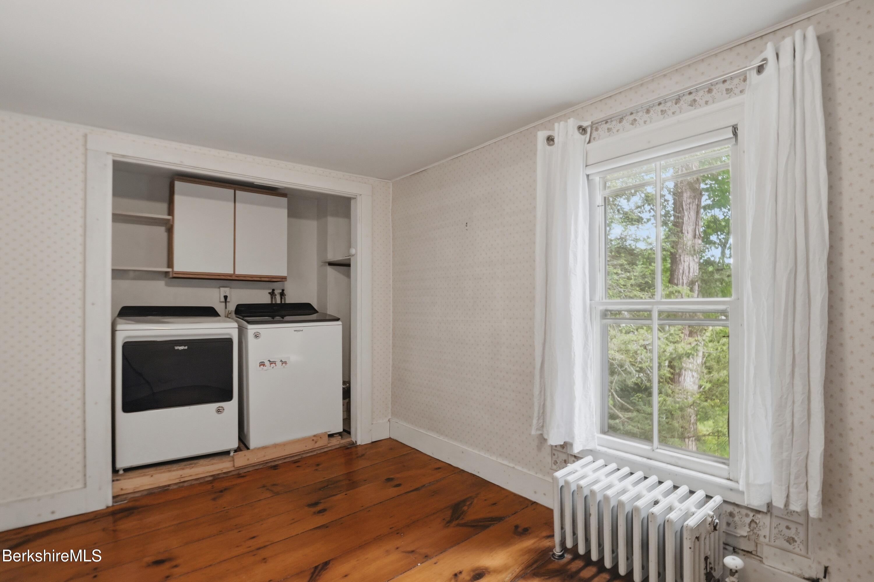 4 Stockbridge Road West Stockbridge, MA 01266 - Photo 66 of 94 a kitchen with granite countertop white cabinets and white appliances
