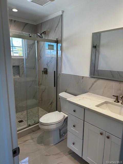 25 Maple Place Hicksville, NY 11801 - Photo 12 of 14 a bathroom with a sink toilet and shower