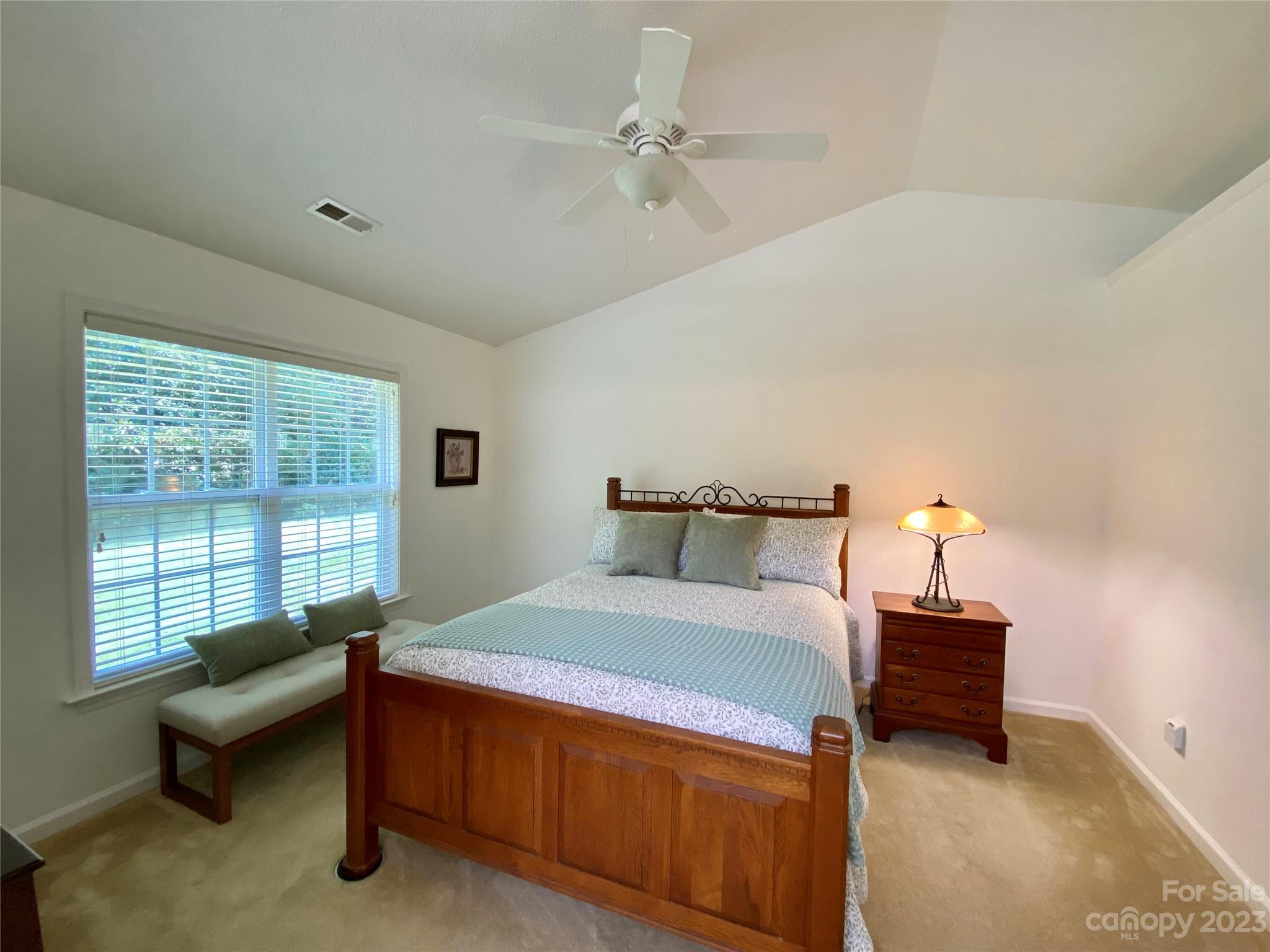 164 Cottage Ridge Road Fletcher, NC 28732 - Photo 11 of 23 a bedroom with a bed and a window