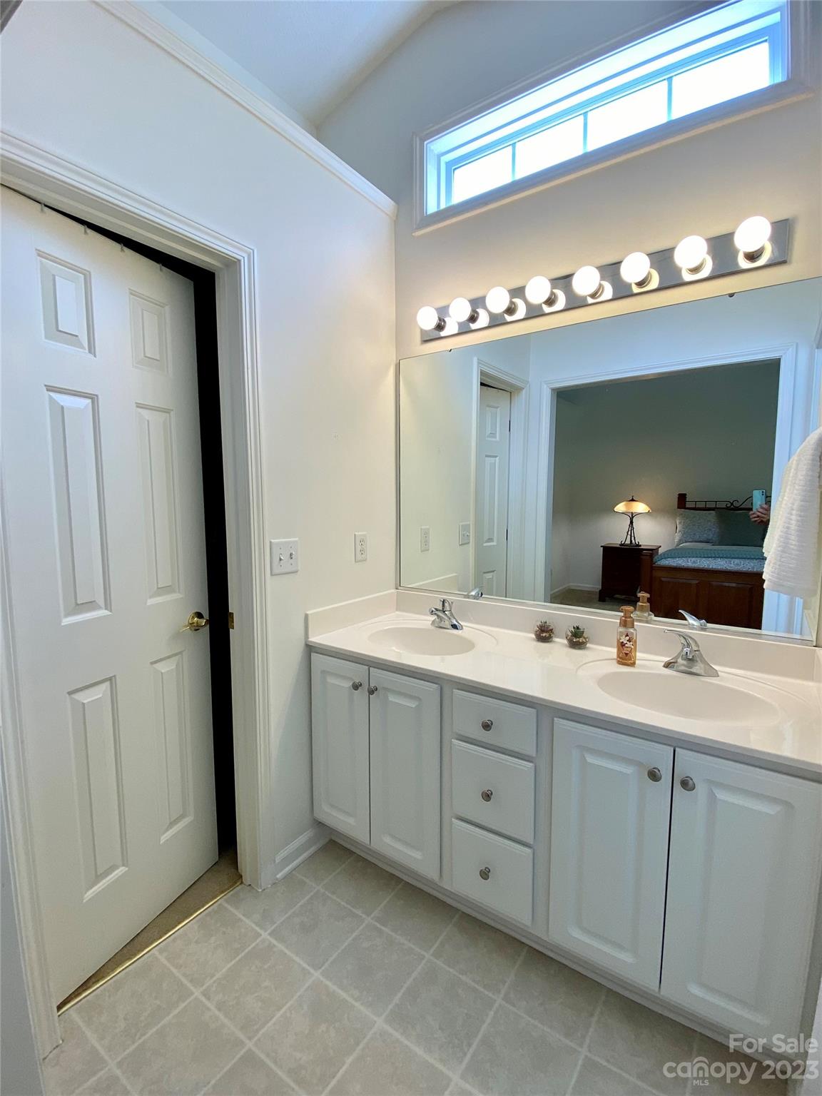 164 Cottage Ridge Road Fletcher, NC 28732 - Photo 14 of 23 a bathroom with a double vanity sink and a mirror