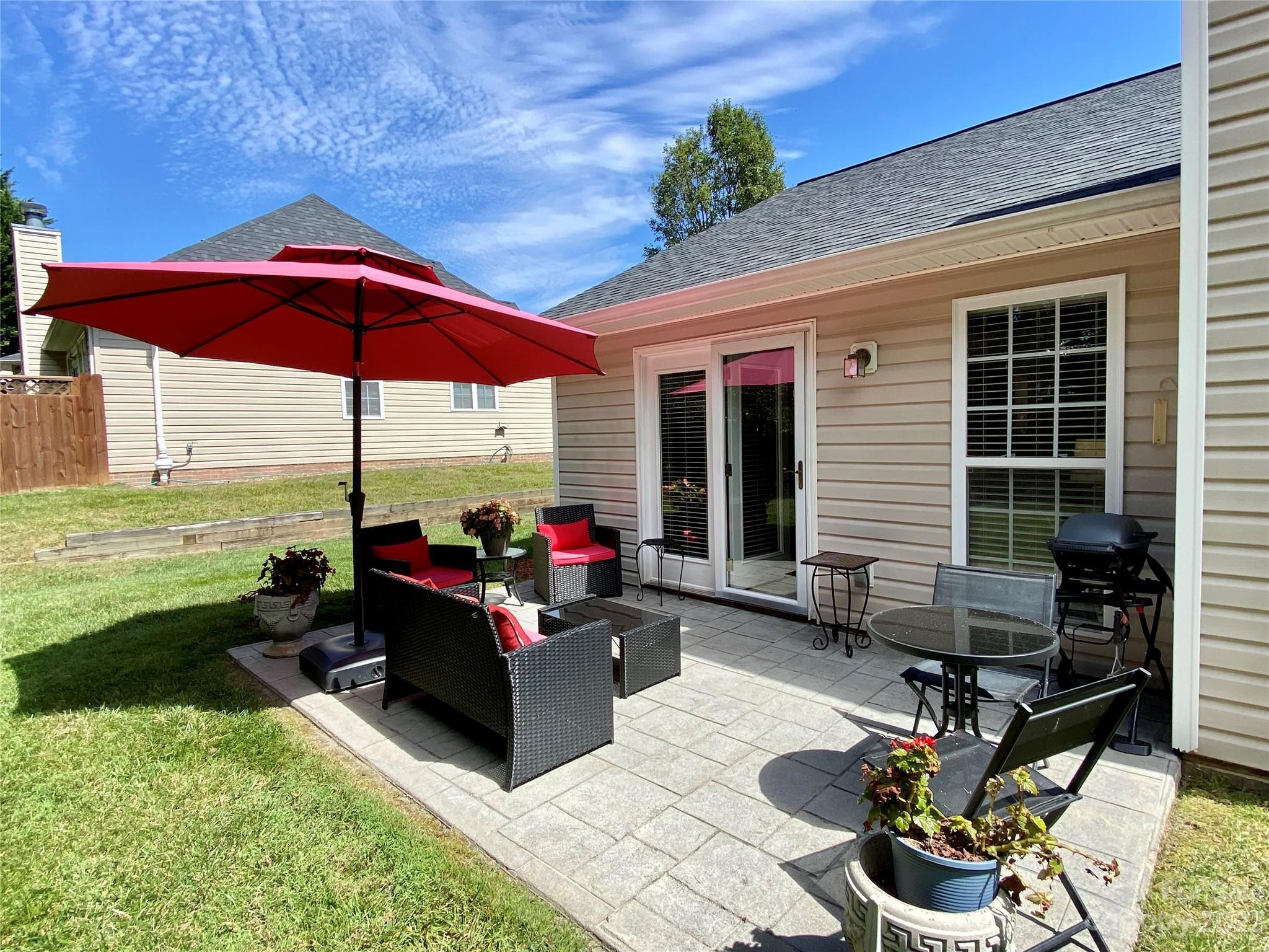 164 Cottage Ridge Road Fletcher, NC 28732 - Photo 20 of 23 a living room with patio furniture and a potted plants