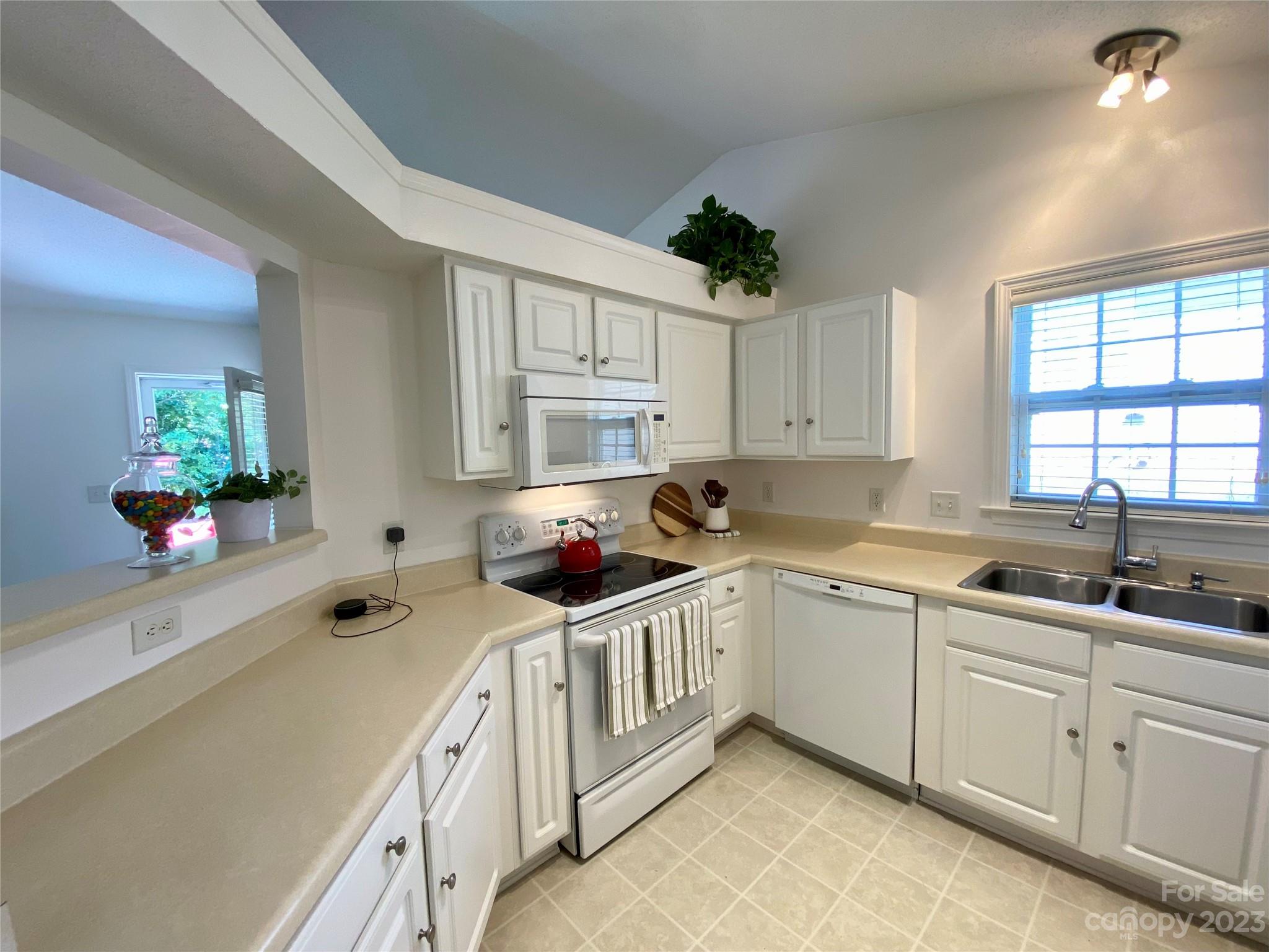 164 Cottage Ridge Road Fletcher, NC 28732 - Photo 8 of 23 a kitchen with a sink and cabinets