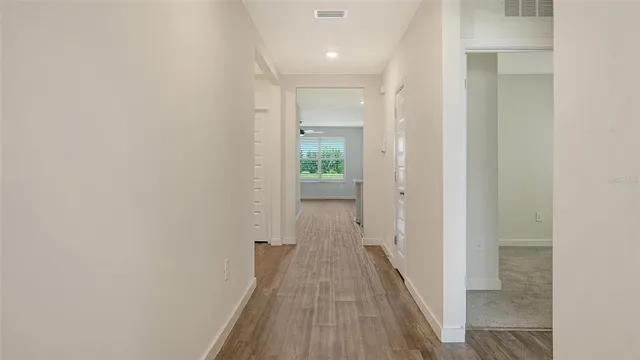 a view of a bathroom from the hallway