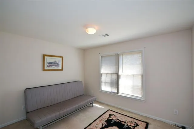 a kitchen with stainless steel appliances granite countertop a sink and a stove