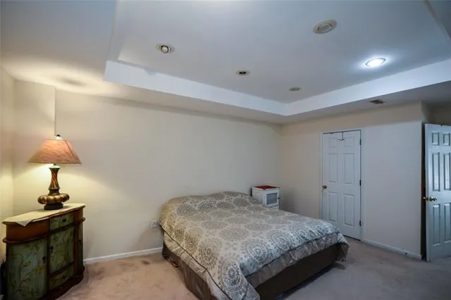 an aerial view of a house with a swimming pool