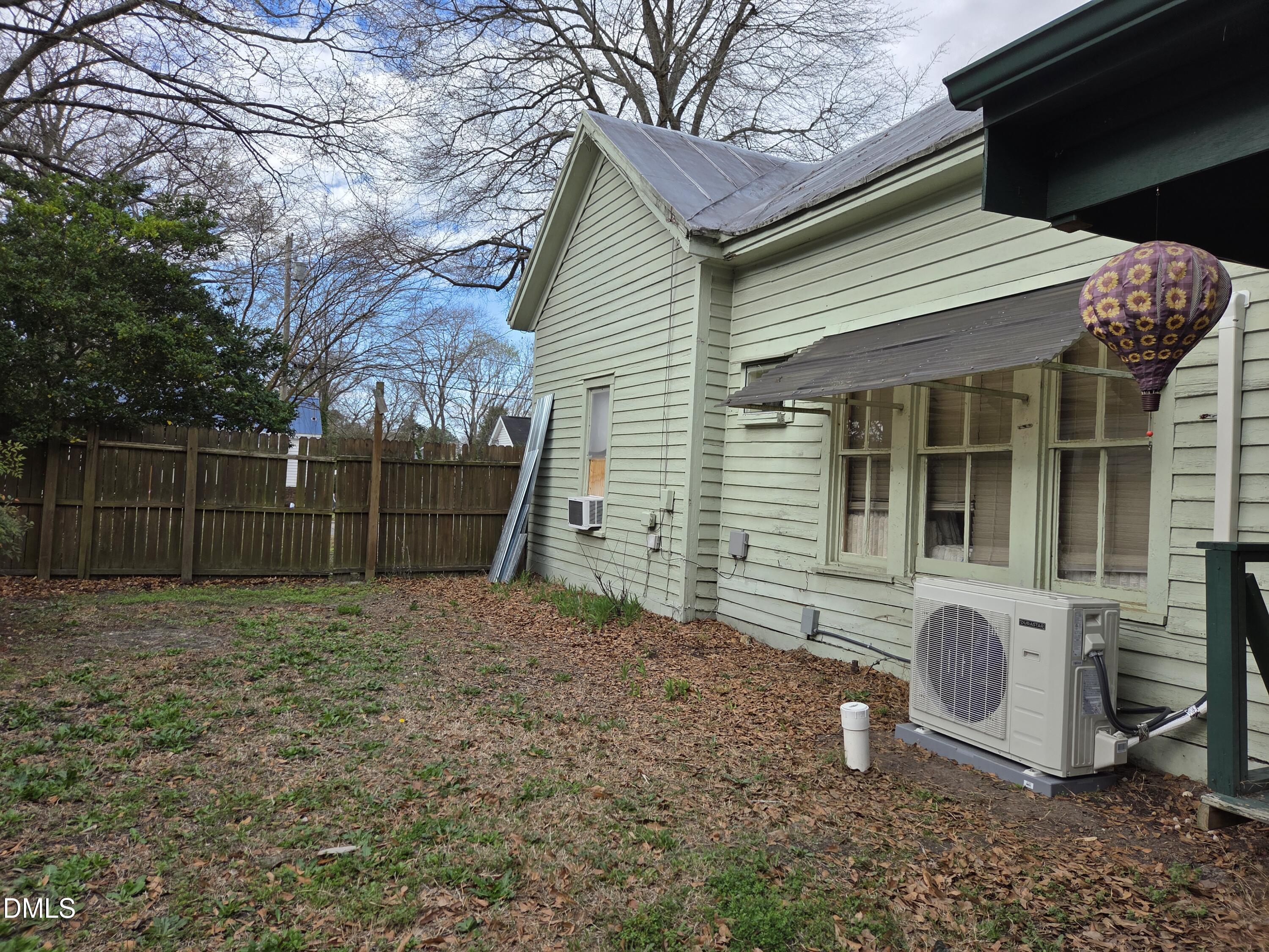 812 West Anderson Street Selma, NC 27576 - Photo 17 of 20 a front view of a house with a yard