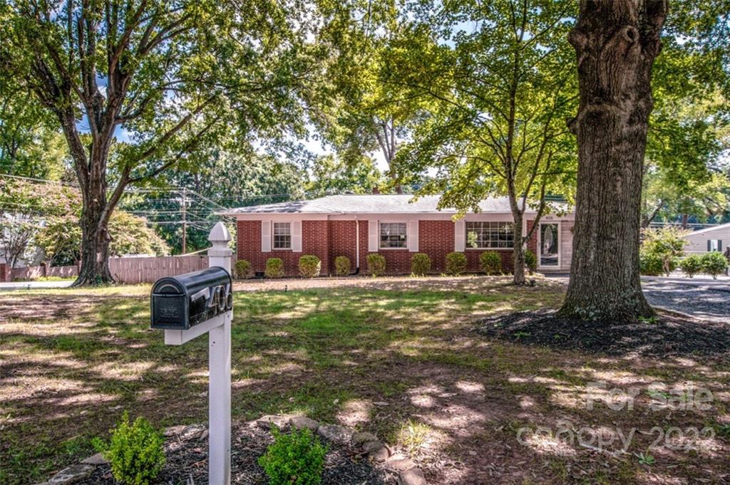 406 Fieldstone Road Mooresville, NC 28115 - Photo 2 of 43 a front view of a house with a garden