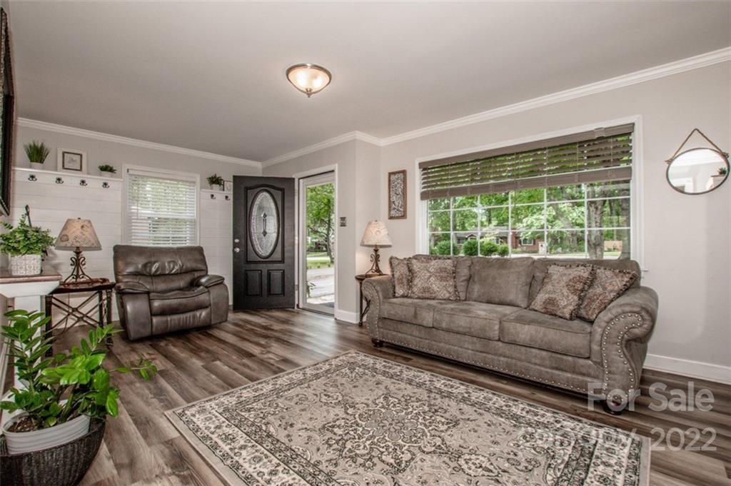 406 Fieldstone Road Mooresville, NC 28115 - Photo 32 of 43 a living room with furniture and a large window