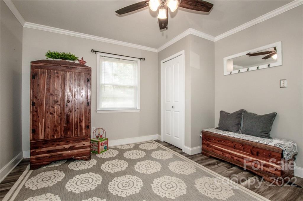 406 Fieldstone Road Mooresville, NC 28115 - Photo 35 of 43 a bedroom with furniture and window
