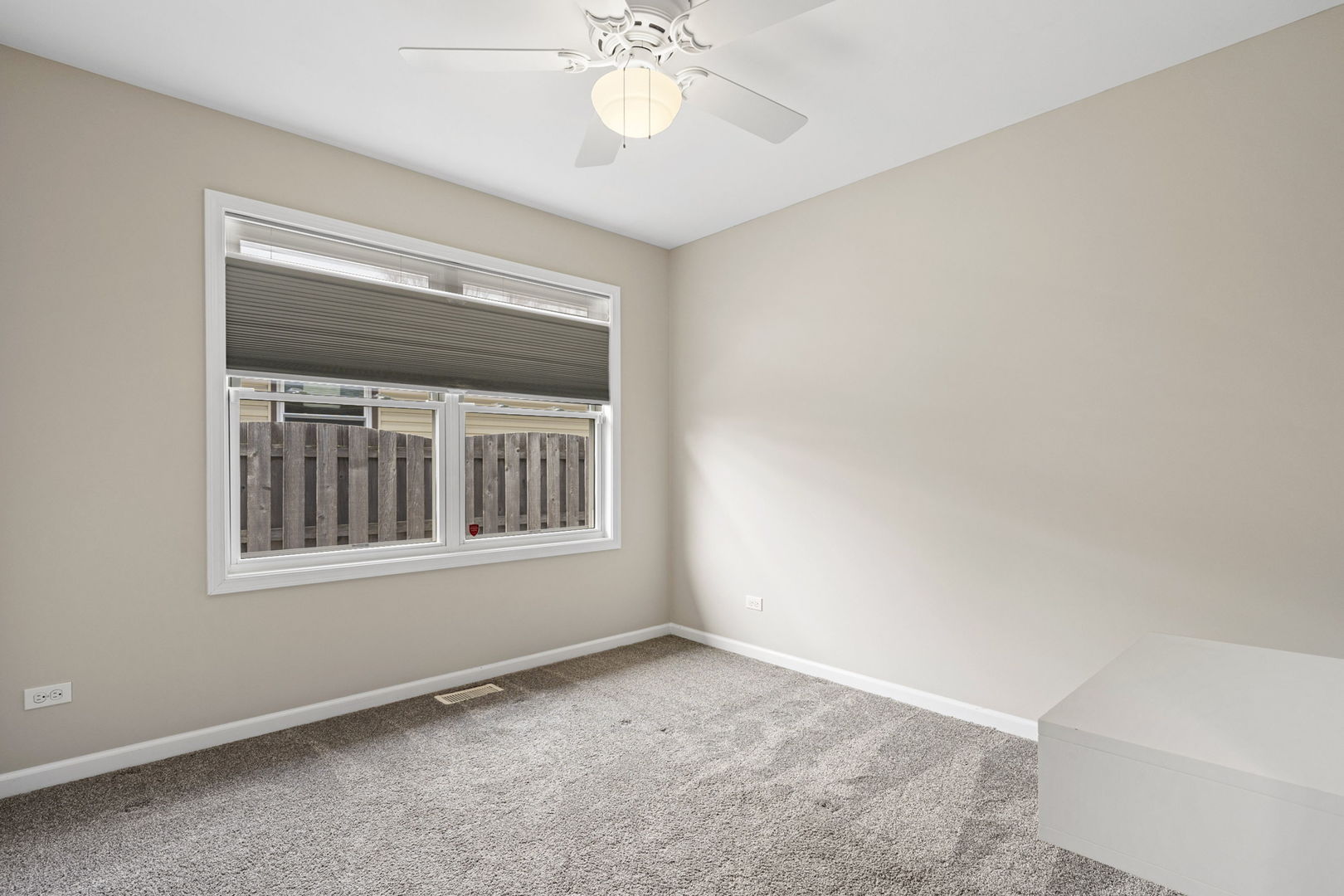 61 Avon Road Elk Grove Village, IL 60007 - Photo 19 of 41 an empty room with a window