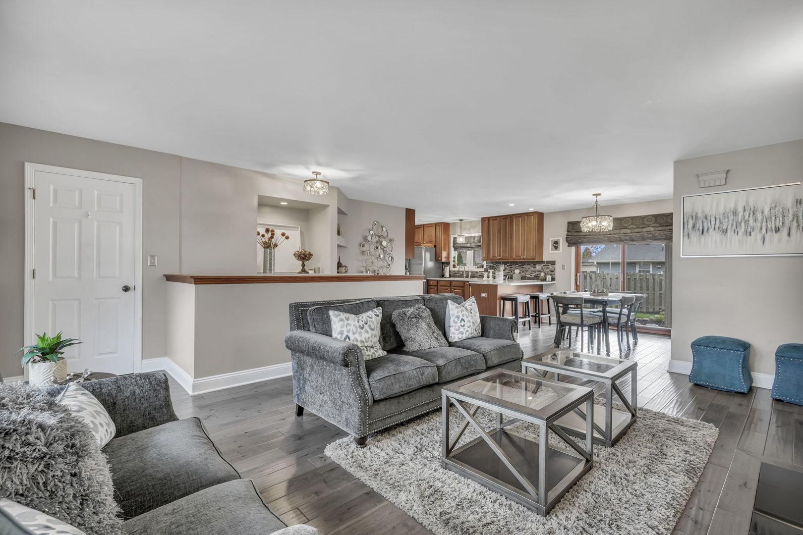 61 Avon Road Elk Grove Village, IL 60007 - Photo 5 of 41 a living room with furniture and a wooden floor