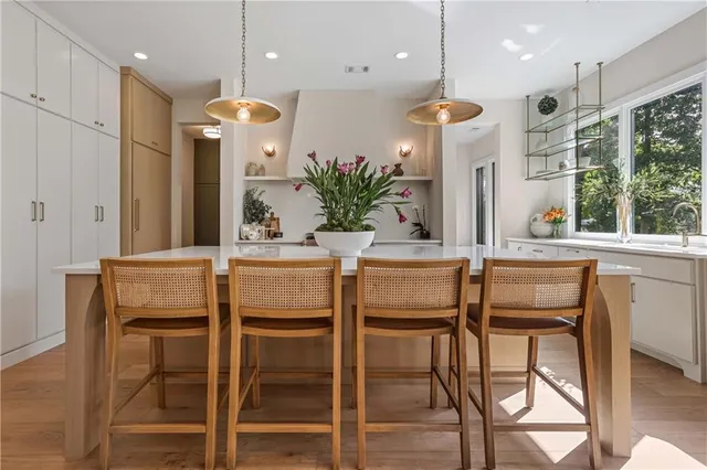 a vase of flowers sitting on a table