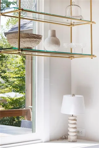 a spacious bedroom with a bed and a couch