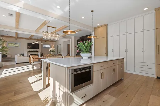 a bathroom with a double vanity sink double mirror and bathtub