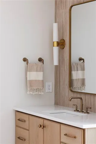 a view of a house with a yard and a tree