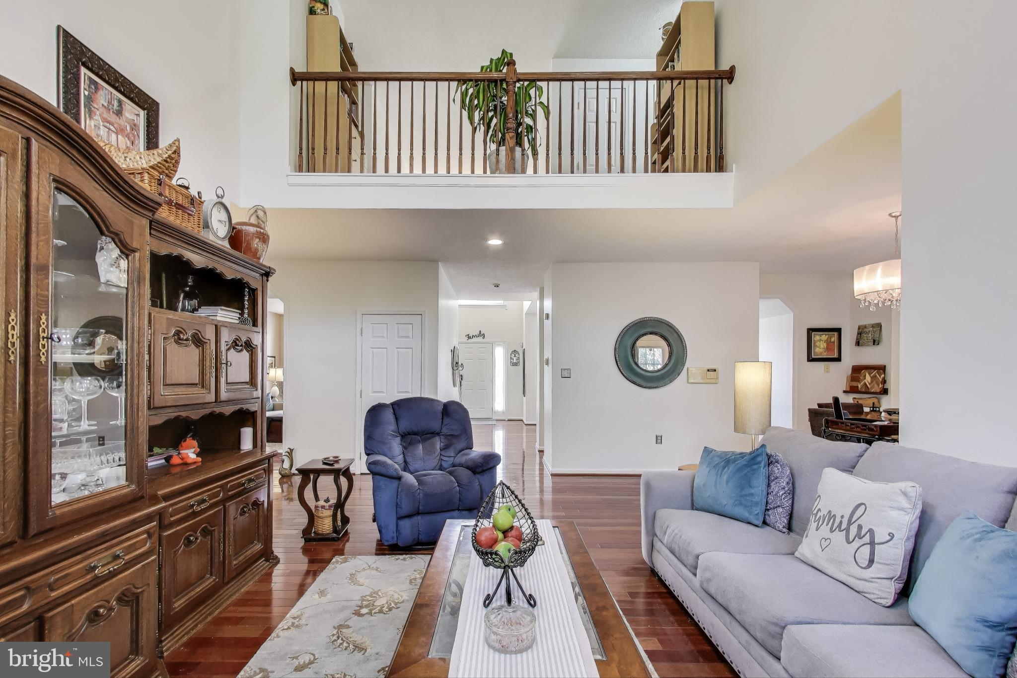 2323 Springdale Lane Waldorf, MD 20603 - Photo 16 of 51 a living room with furniture and a fireplace