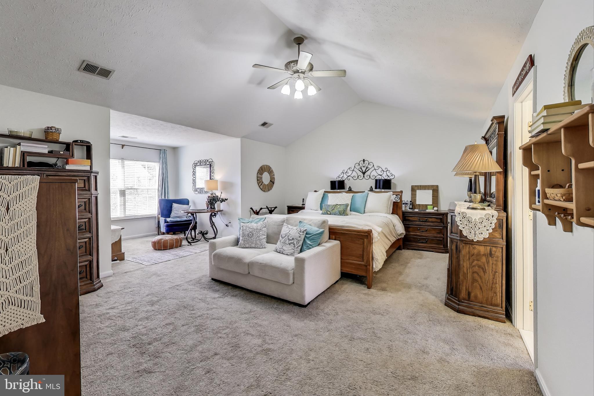2323 Springdale Lane Waldorf, MD 20603 - Photo 23 of 51 a bed room with furniture and a chandelier