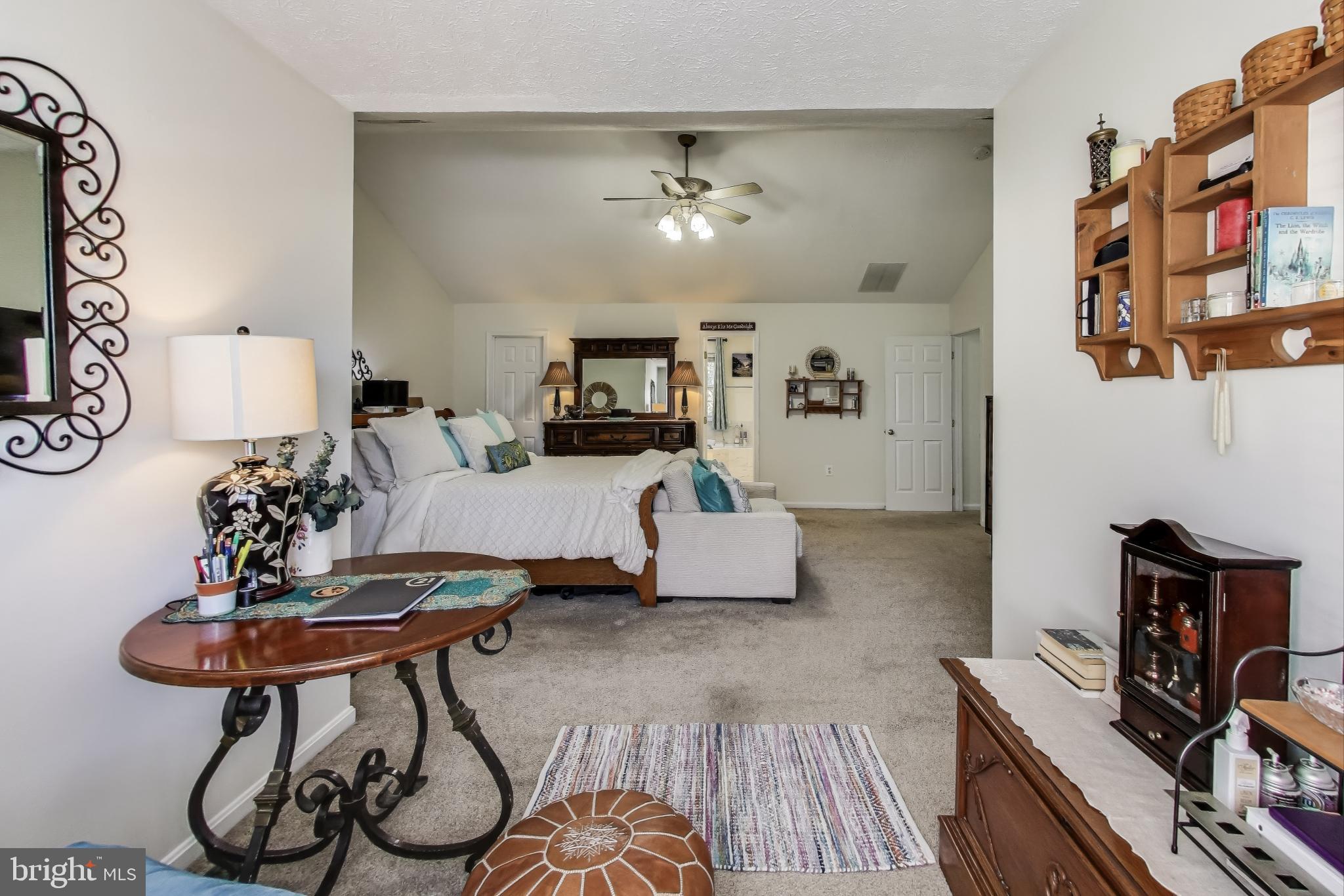 2323 Springdale Lane Waldorf, MD 20603 - Photo 26 of 51 a living room with furniture and a chandelier