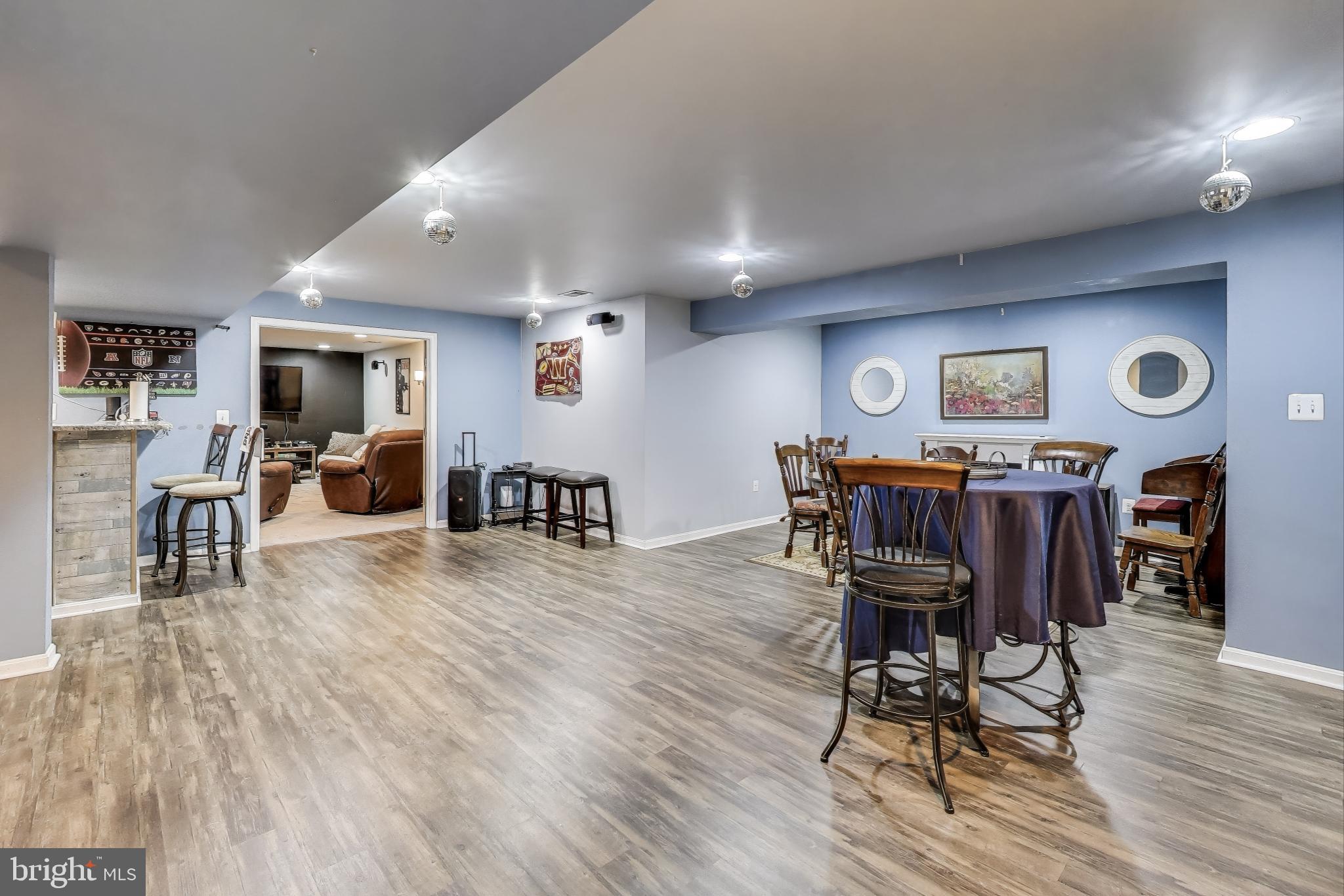 2323 Springdale Lane Waldorf, MD 20603 - Photo 38 of 51 a view of a dining room with furniture and wooden floor