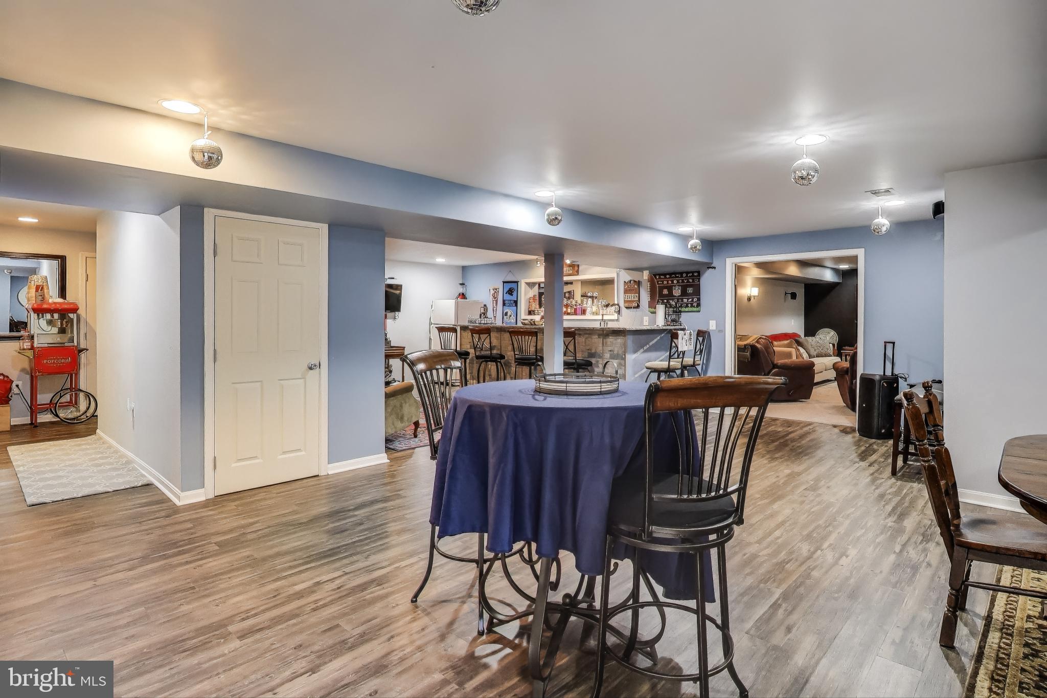 2323 Springdale Lane Waldorf, MD 20603 - Photo 39 of 51 a view of a dining room with furniture and wooden floor