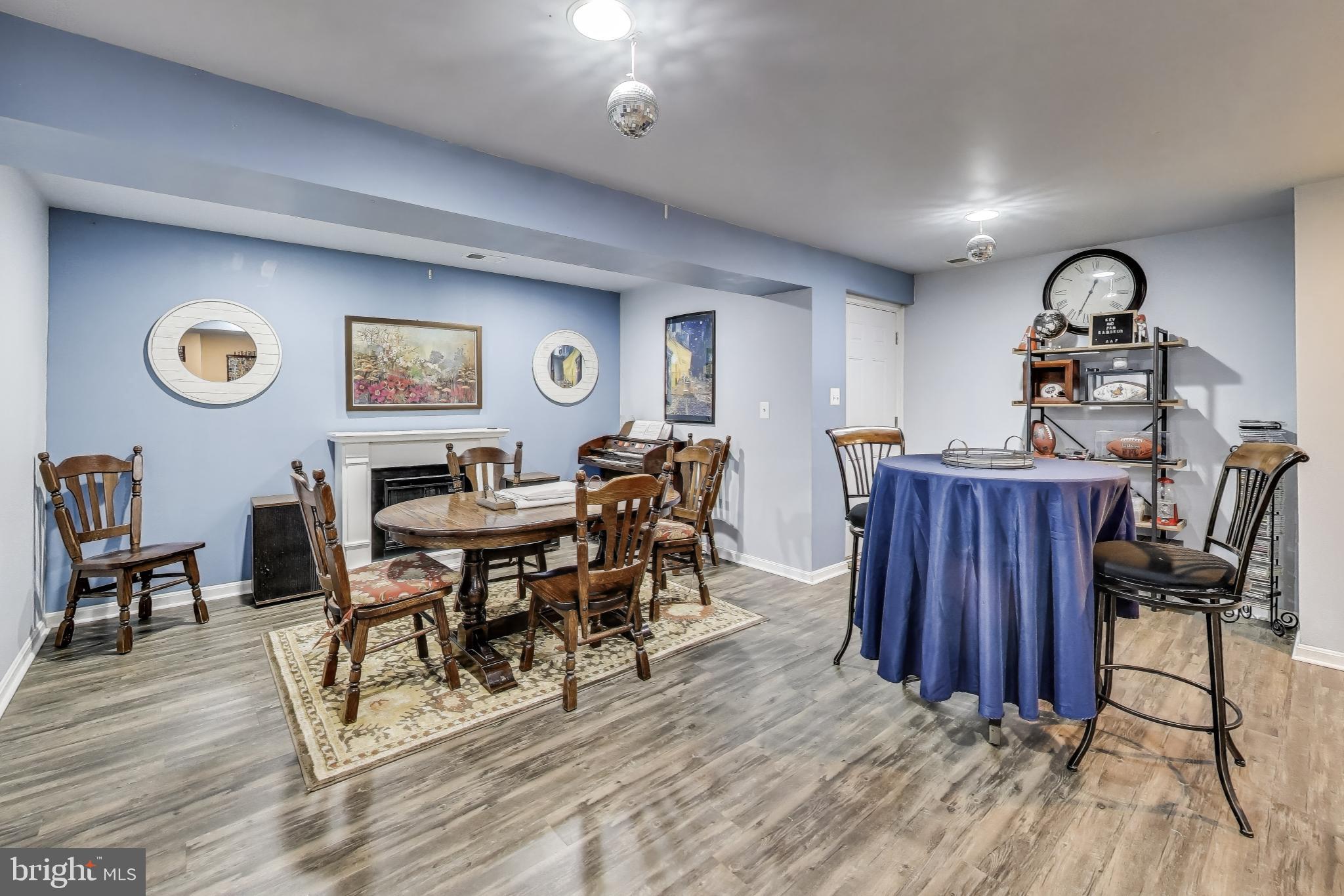 2323 Springdale Lane Waldorf, MD 20603 - Photo 40 of 51 a view of a dining room with furniture and wooden floor
