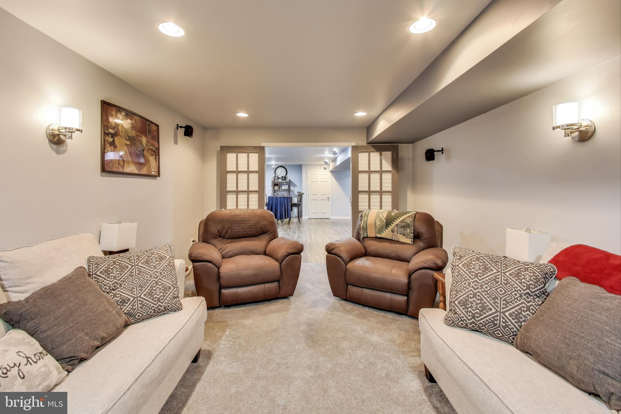 2323 Springdale Lane Waldorf, MD 20603 - Photo 45 of 51 a living room with furniture a couch and a couch