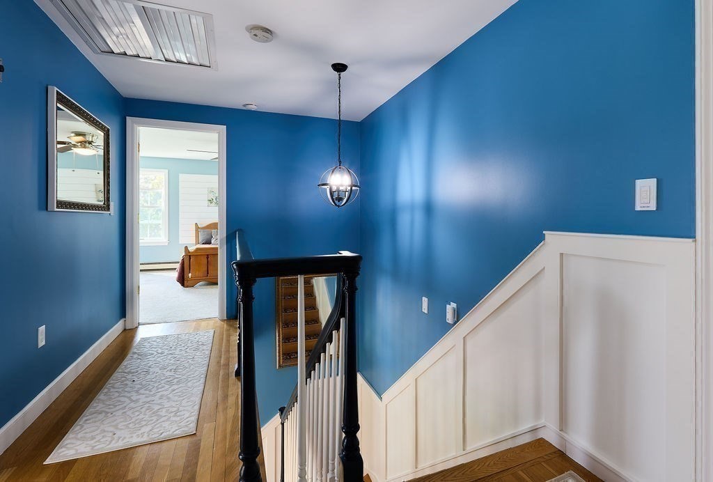 58 Buttercup Lane Hanover, MA 02339 - Photo 17 of 35 a view of hallway with stairs