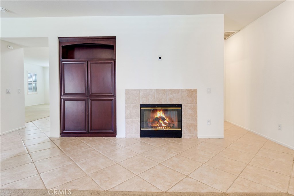 9140 Village Way Riverside, CA 92508 - Photo 8 of 37 Family room fireplace