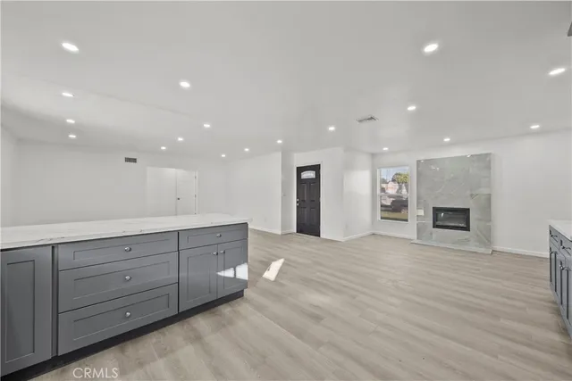 a view of a backyard with plants and a garden