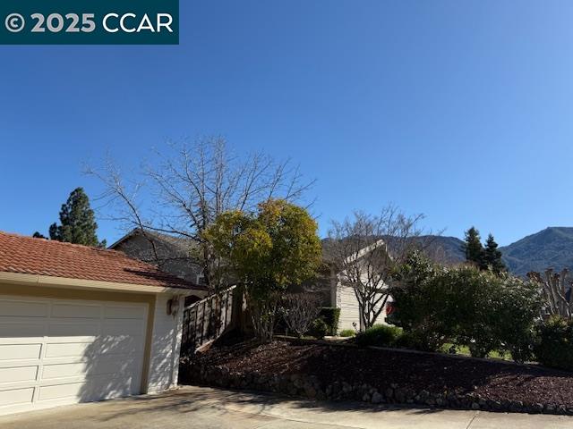 Dana Hills Clayton, CA 94517 - Photo 15 of 15 a view of a house with a yard