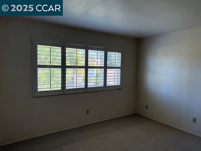 Dana Hills Clayton, CA 94517 - Photo 10 of 15 an empty room with a window