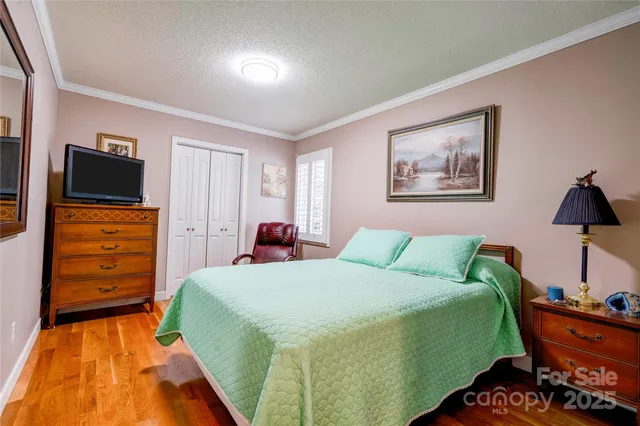 a bedroom with a bed and furniture