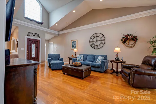 a living room with furniture and a table