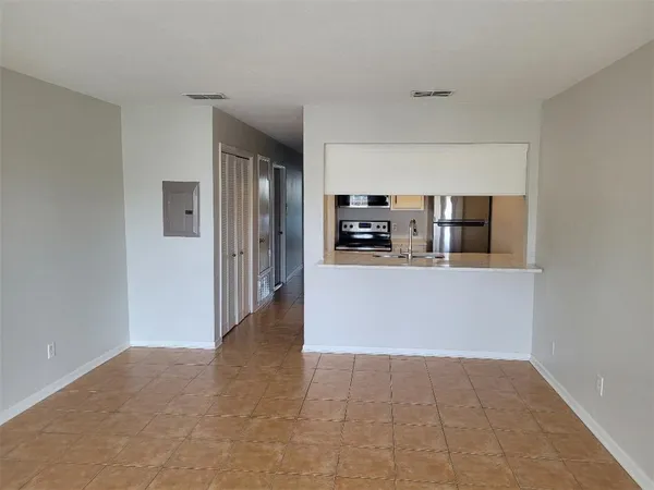 a view of a kitchen with a sink