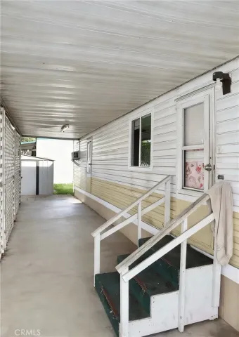 a view of a garage with table and chairs
