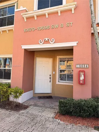 a street sign on a brick building