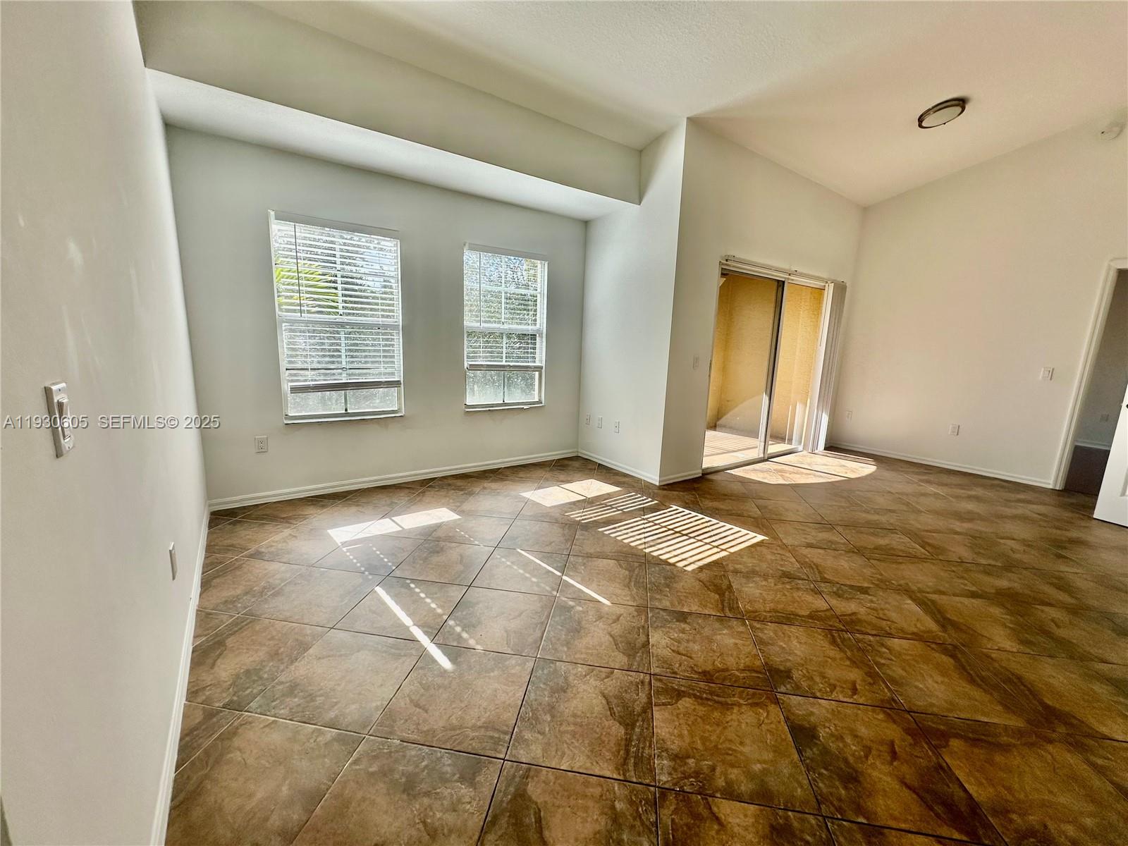 4190 San Marino Boulevard, Unit 303 West Palm Beach, FL 33409 - Photo 4 of 19 a view of an empty room