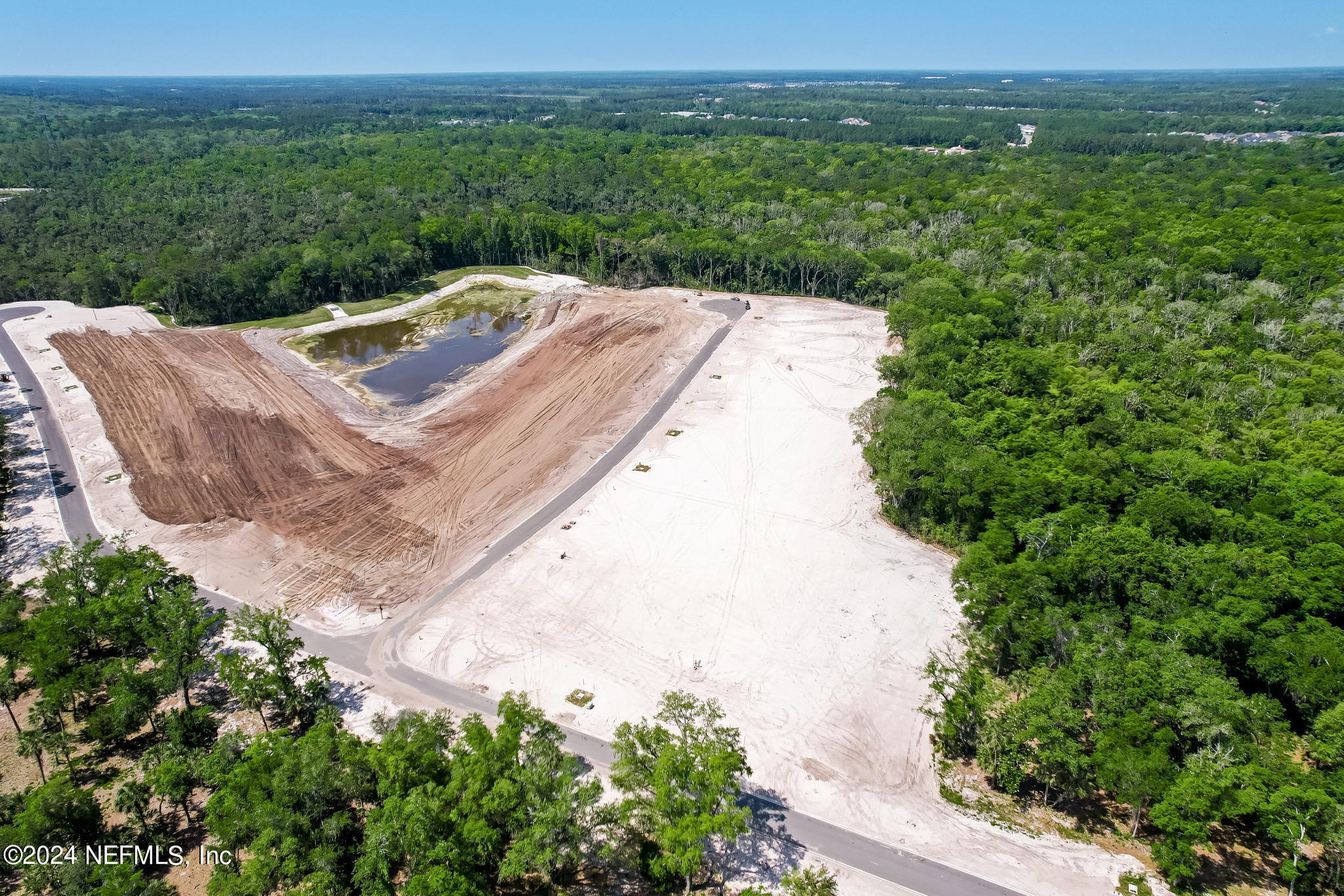 340 Shell Ridge Lane Ponte Vedra, FL 32081 - Photo 12 of 27 an aerial view of a house with a yard and lake view