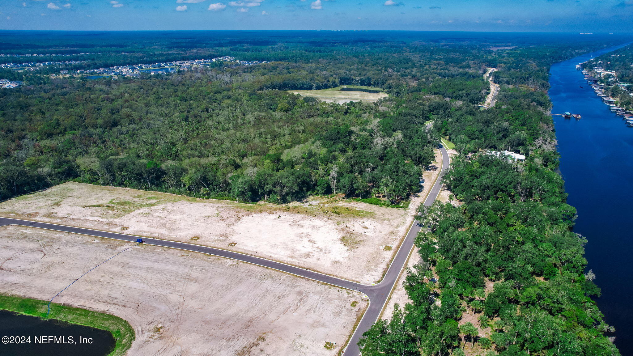 340 Shell Ridge Lane Ponte Vedra, FL 32081 - Photo 2 of 27 a view of a yard with an ocean