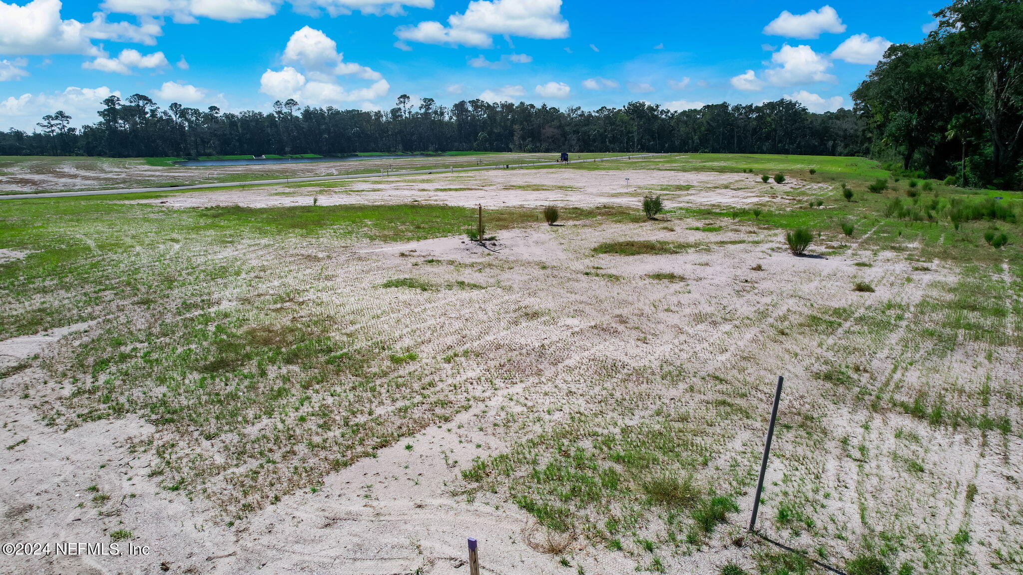 340 Shell Ridge Lane Ponte Vedra, FL 32081 - Photo 7 of 27 a view of a lake with houses in the back