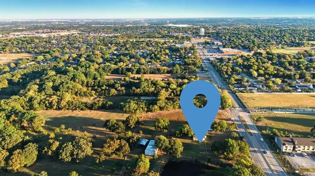 an aerial view of a house with a outdoor space
