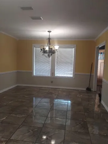 a view of a livingroom with a window