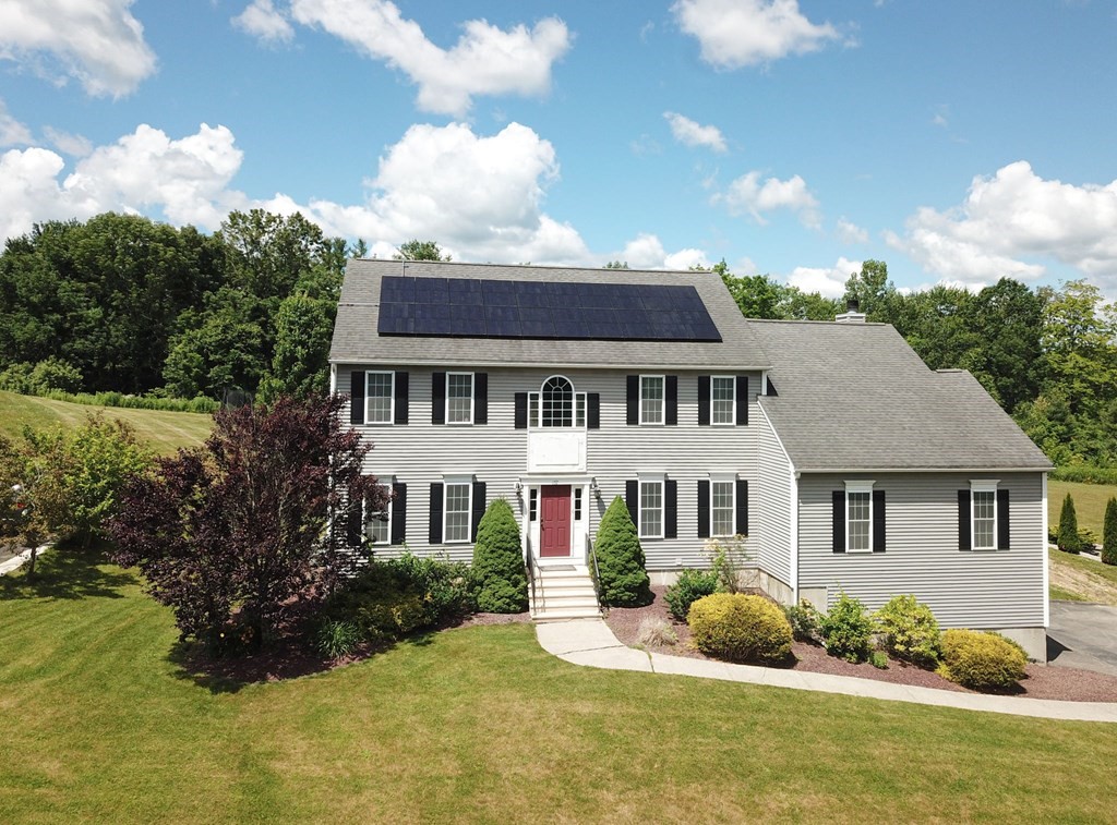 137 Osgood Road Charlton, MA 01507 - Photo 1 of 41 a front view of a house with a yard