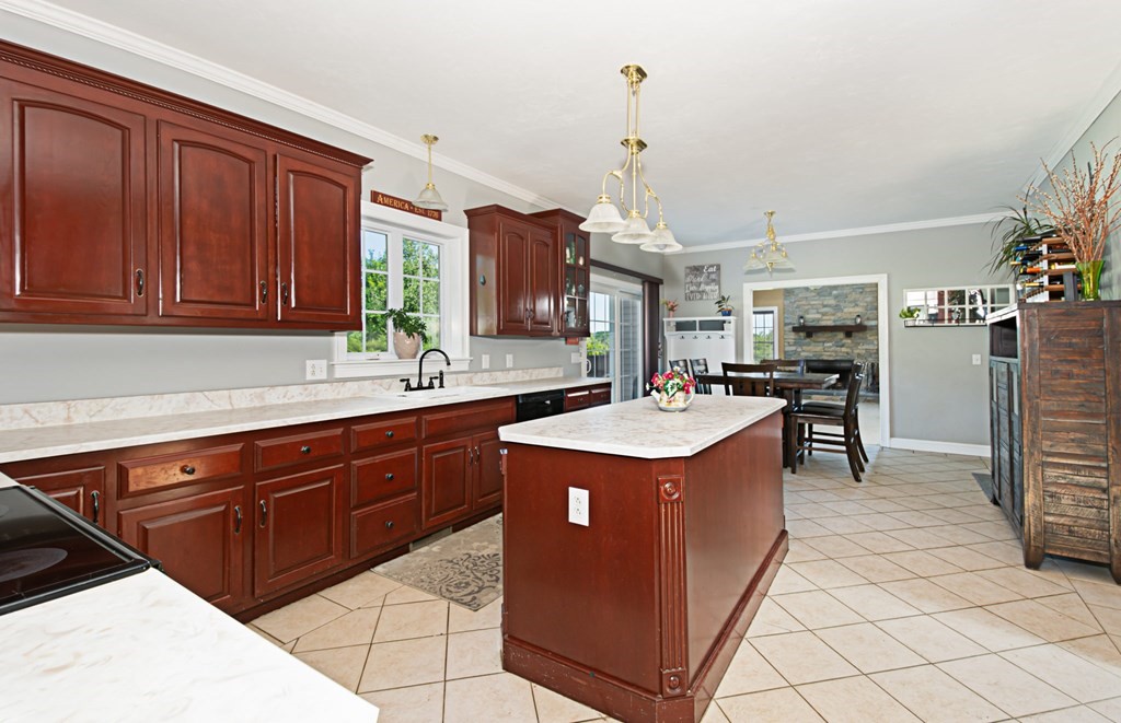 137 Osgood Road Charlton, MA 01507 - Photo 17 of 41 a kitchen that has a sink and a stove in it