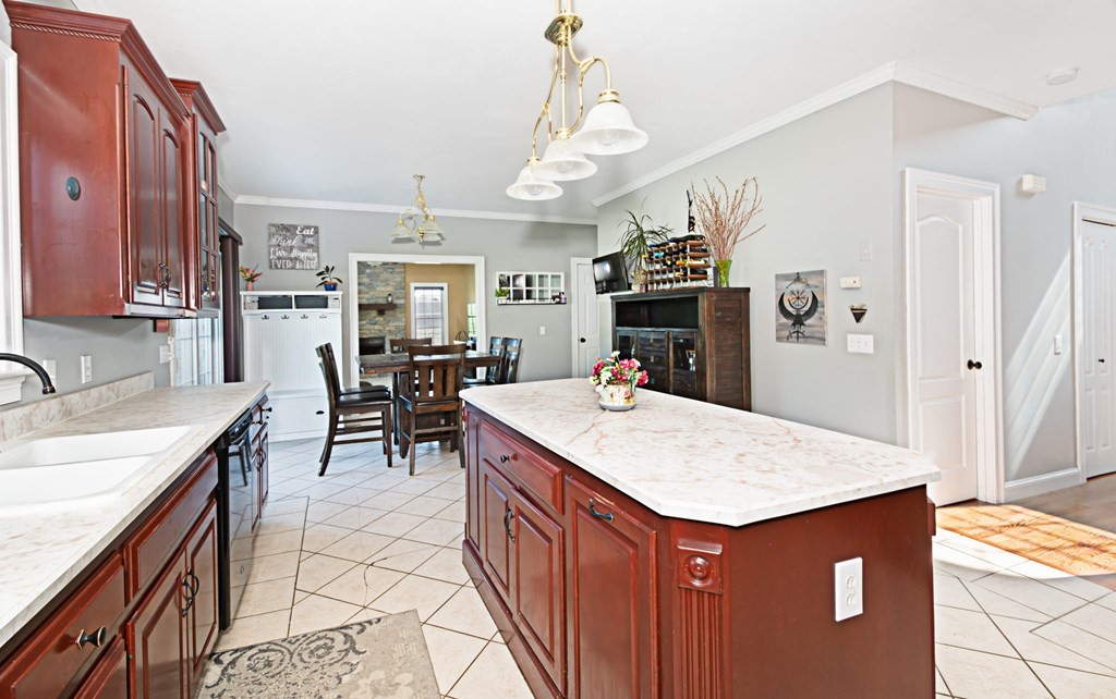 137 Osgood Road Charlton, MA 01507 - Photo 18 of 41 a kitchen with a stove a refrigerator and a sink
