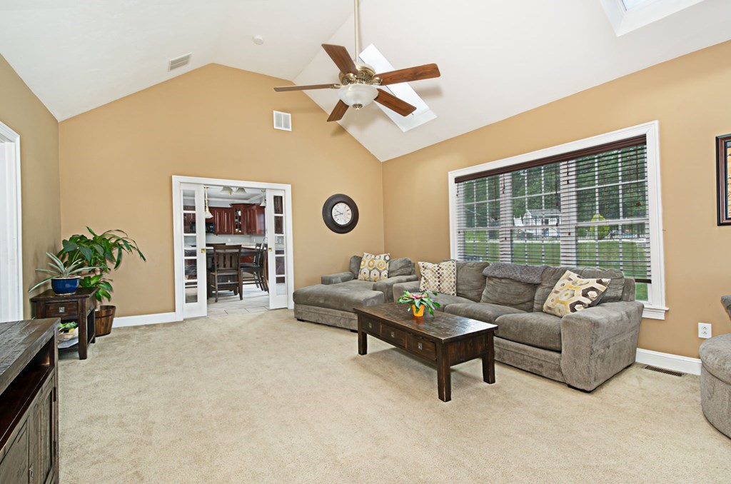 137 Osgood Road Charlton, MA 01507 - Photo 23 of 41 a living room with furniture and a large window