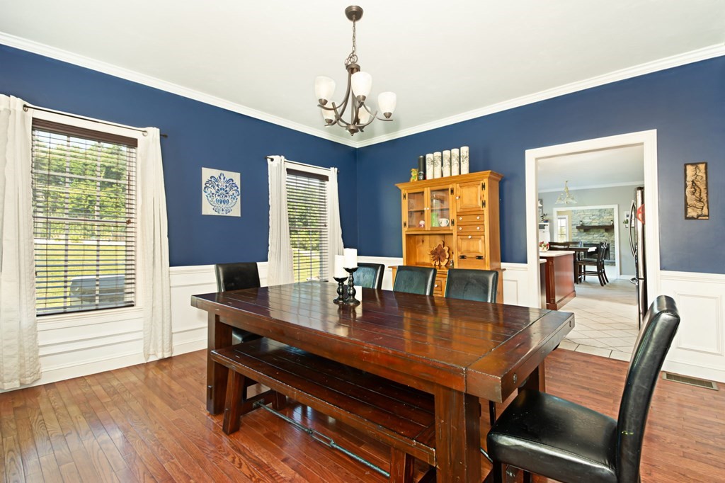 137 Osgood Road Charlton, MA 01507 - Photo 27 of 41 a view of a dining room with furniture window and wooden floor